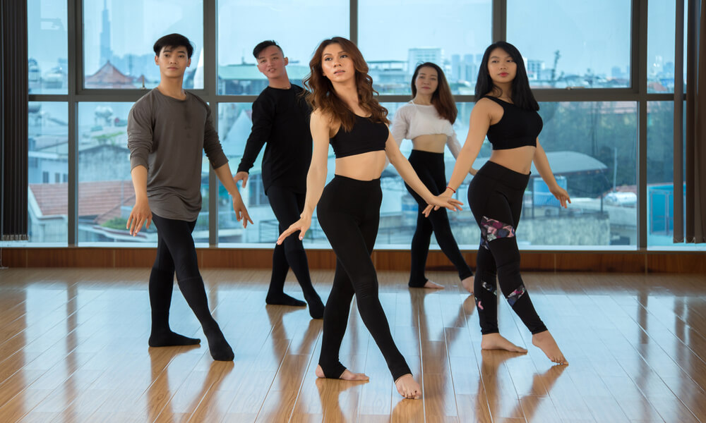 Group of filipino canadian dancers rehearsing