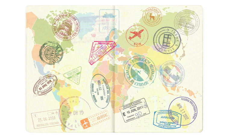 Visa on arrival Different visa stamps on a passport.