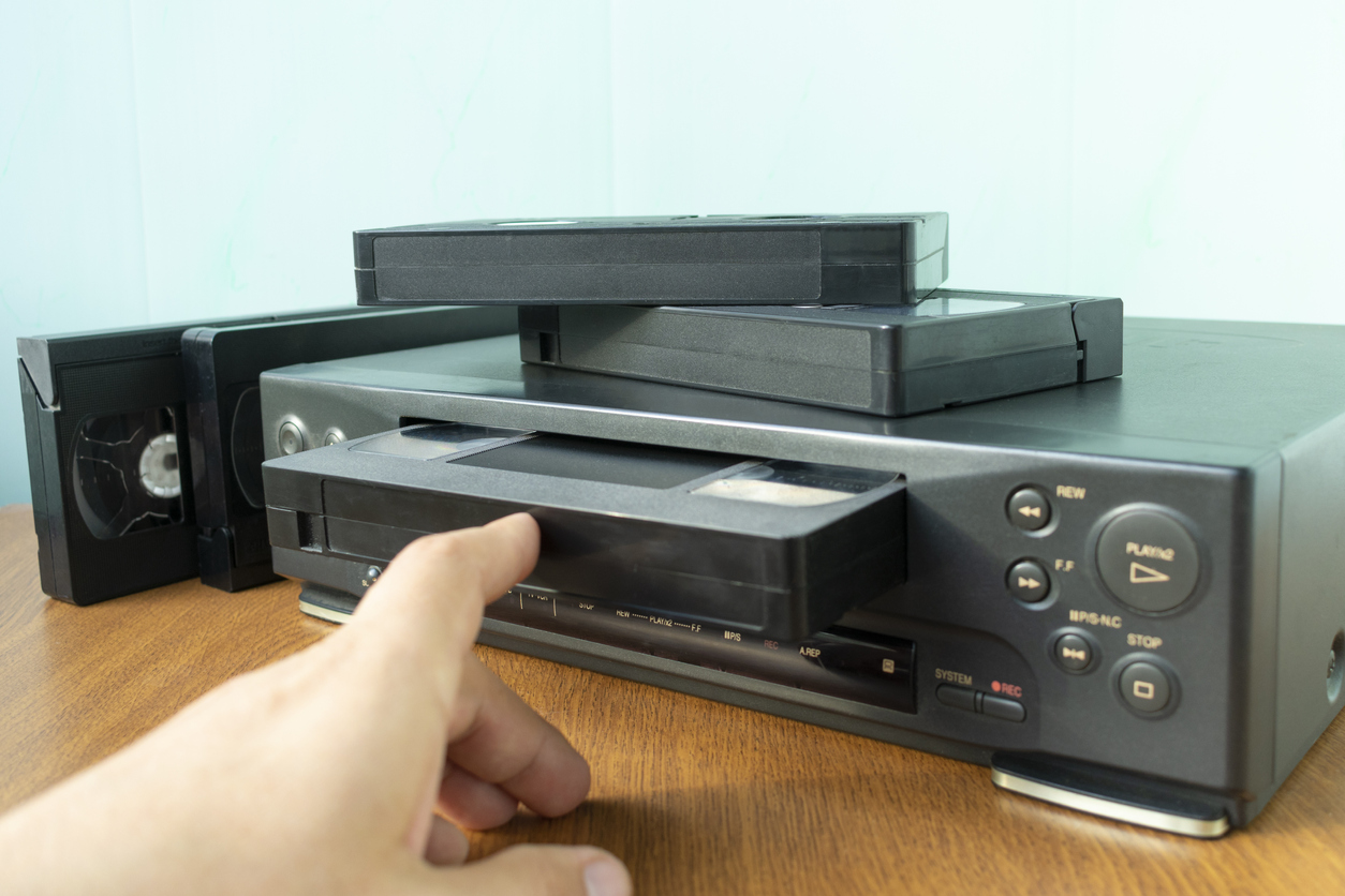 90s gadgets VHS tape in a VHS player