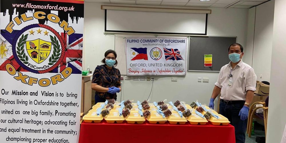 two nurses distributing food from Kabayan Remit