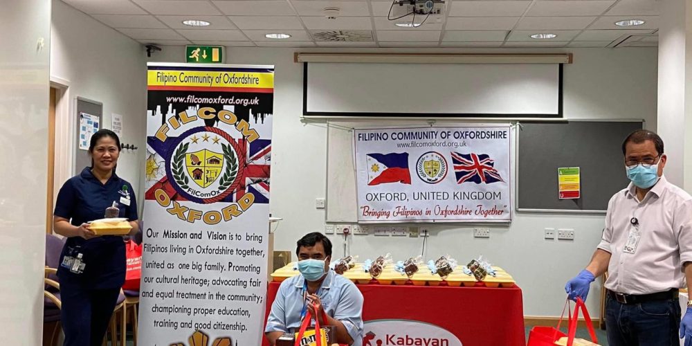 three nurses holding goodie bags from Kabayan Remit
