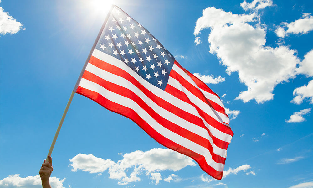 Filipino heroes waving American flag